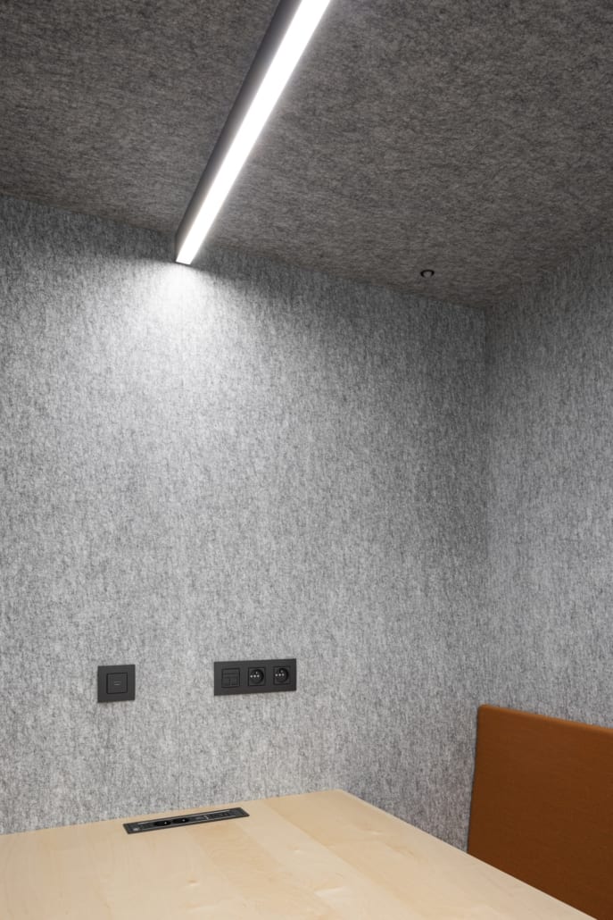 Acoustic silver wall and ceiling cladding with lighting