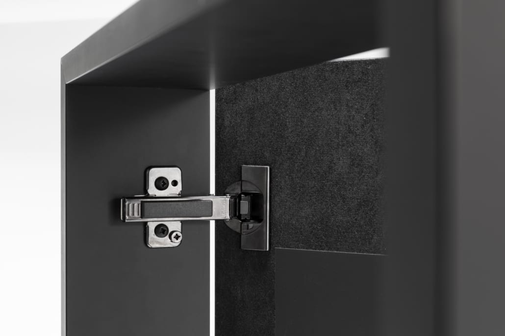 Detail hinge cabinet with cabinet covering in acoustic material
